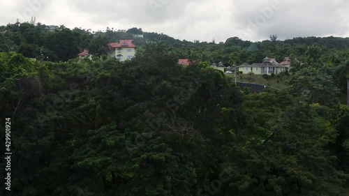 Aerial Reveal of a Neighborhood on The Hill in Jamaica