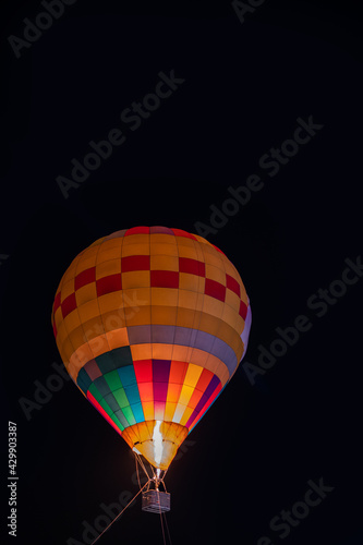 A balloon floating in the sky,Colorful glowing hot air balloons floating in a night sky.