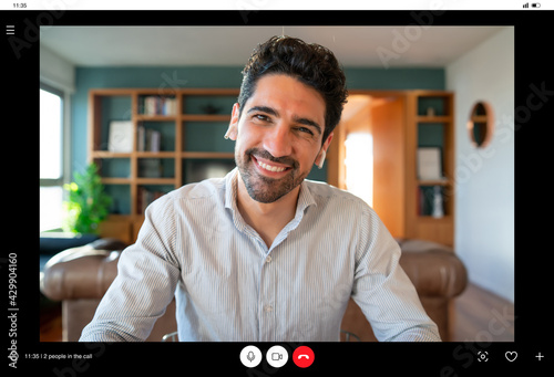 Wallpaper Mural Business man on a work video call from home. Torontodigital.ca