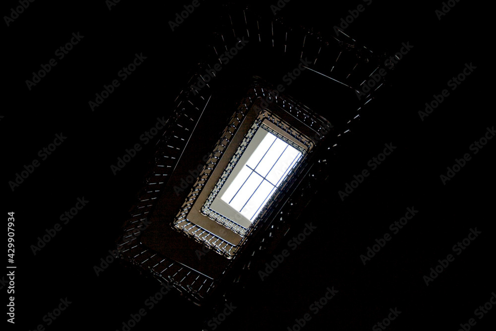 Fototapeta premium Spiral staircase with light