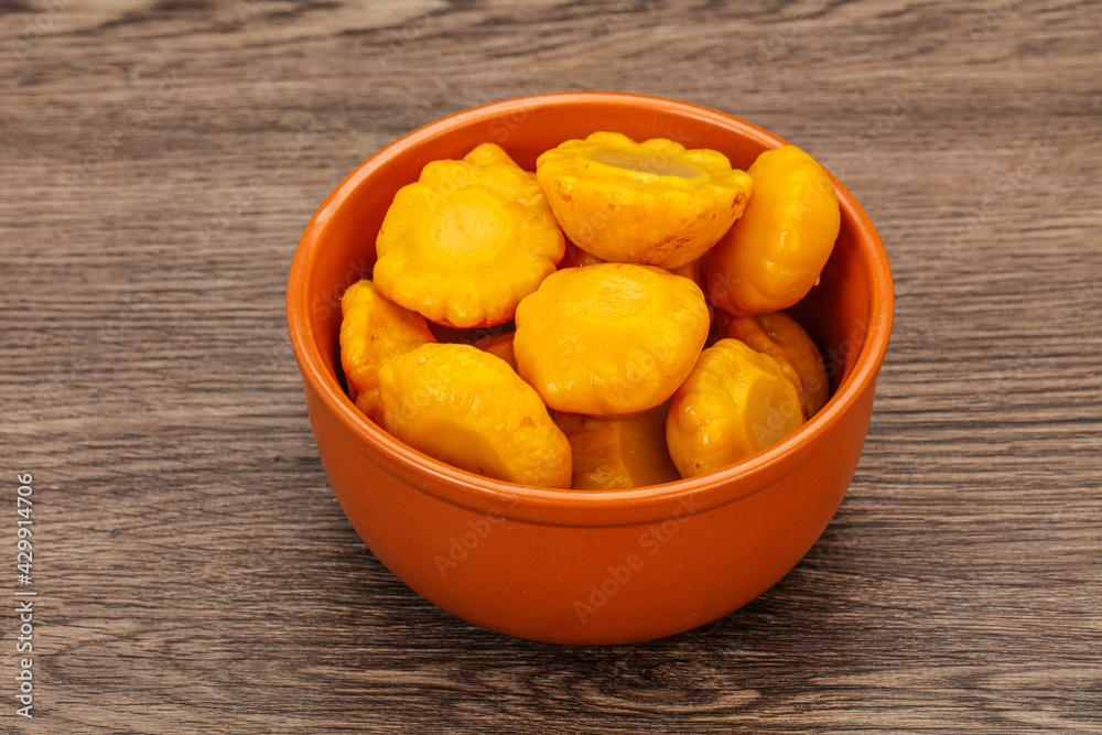Marinated yellow patisson in the bowl Marinated yellow patisson in the bowl