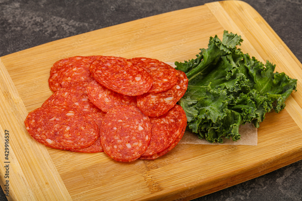 Italian spycy pepperoni sausage slices Italian spycy pepperoni sausage slices