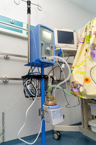 Artificial lung ventilation unit in the medical ward. Selective focus on equipment with oxygen mask. Closeup.