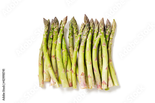 Fresh asparagus for salad or smoothies, healthy food for vegans and raw foodists. isolated on white background, top view
