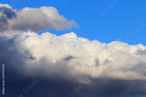 Fototapeta Naklejka Na Ścianę i Meble -  Rain gray clouds in the blue sky during the day. 