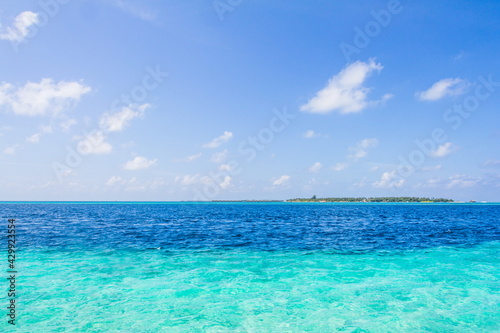 Azure water in the lagoon of the tropical island in the Maldives