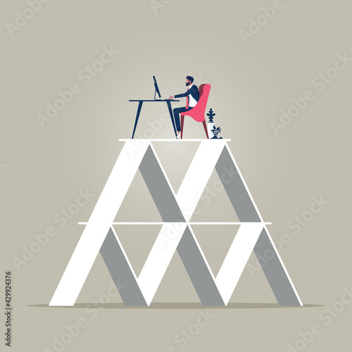 Business concept of Limitations and risks of work, Businessman work on a podium on a house of cards depicting instability and risk