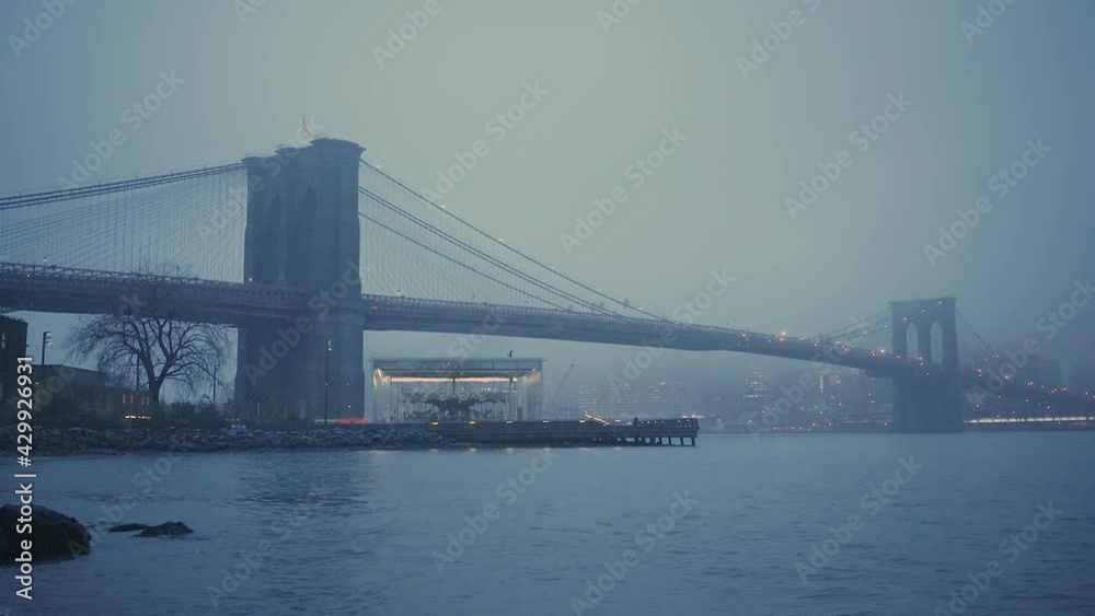 Brooklyn bridge at foggy morning, New York City. Brooklyn bridge at foggy morning, New York City.