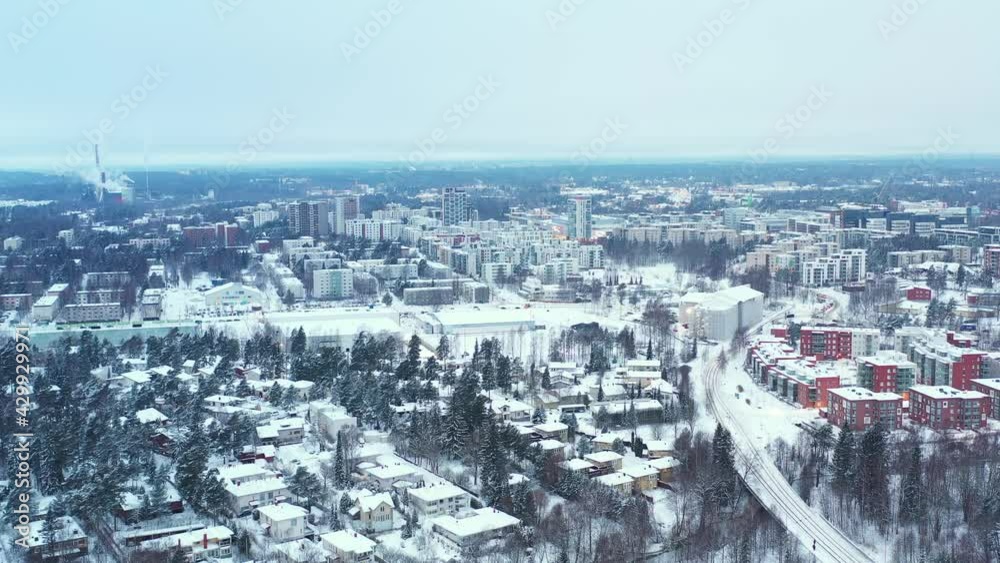 Aerial view of Matinkyla neighborhood of Espoo, Finland. Snow-covered city in winter. Aerial view of Matinkyla neighborhood of Espoo, Finland. Snow-covered city in winter.