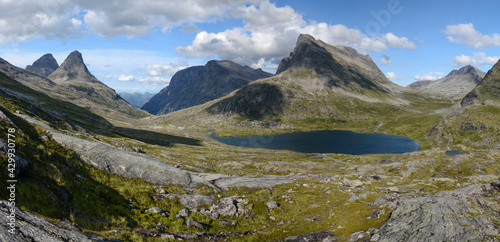 Norwegian mountainous landscape. Panoramic view of Alnesvatnet lake from Mannen hiking trail.