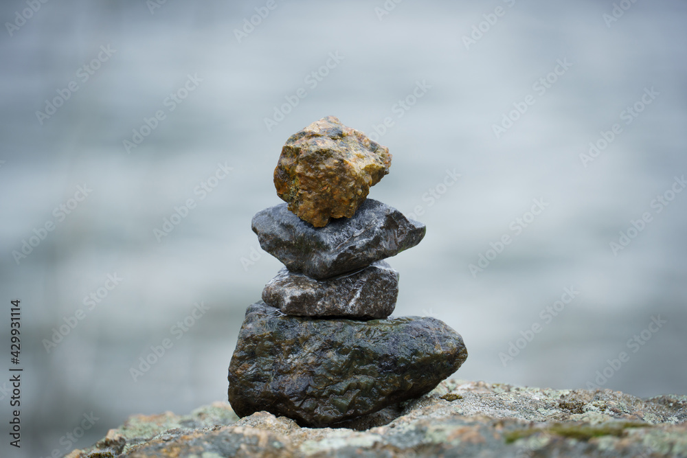 pebbles one by one. the composition of wet rubble is laid on top of each other. pebbles one by one. the composition of wet rubble is laid on top of each other.