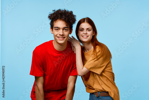 young couple multicolored t-shirts modern style fashion