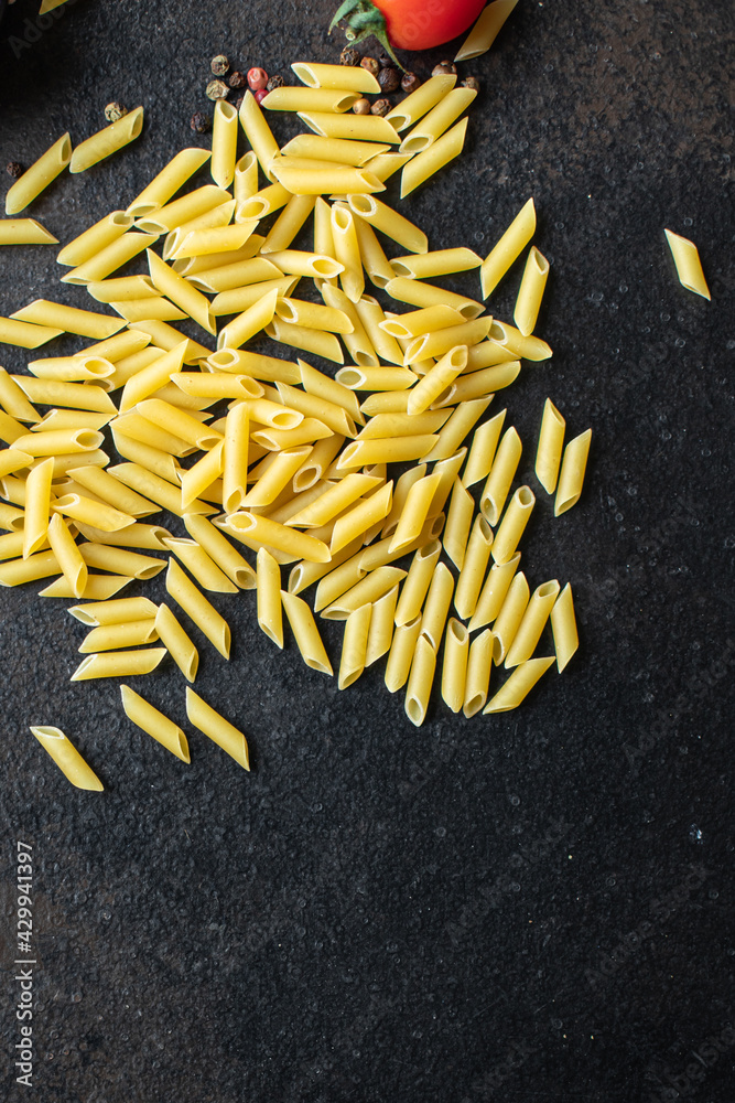 pasta penne durum wheat trend meal snack copy space food background rustic. top view