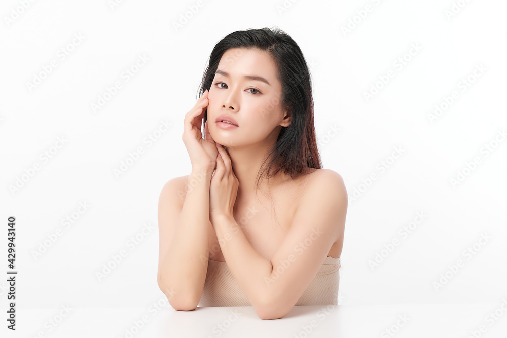 Beautiful young asian woman with clean fresh skin on white background, Face care, Facial treatment, Cosmetology, beauty and spa, Asian women portrait Beautiful young asian woman with clean fresh skin on white background, Face care, Facial treatment, Cosmetology, beauty and spa, Asian women portrait