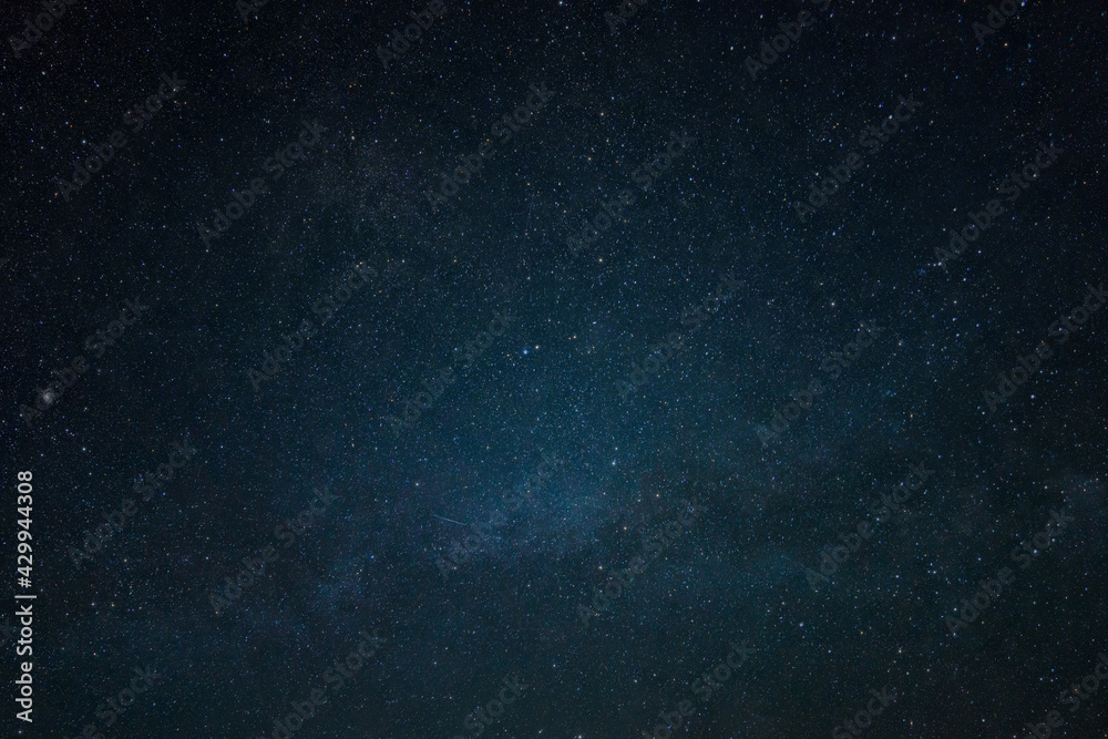Fototapeta Beautiful starry sky wallpaper. Deep space background