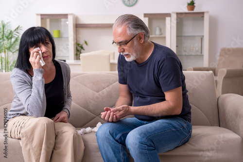 Old couple having argument at home