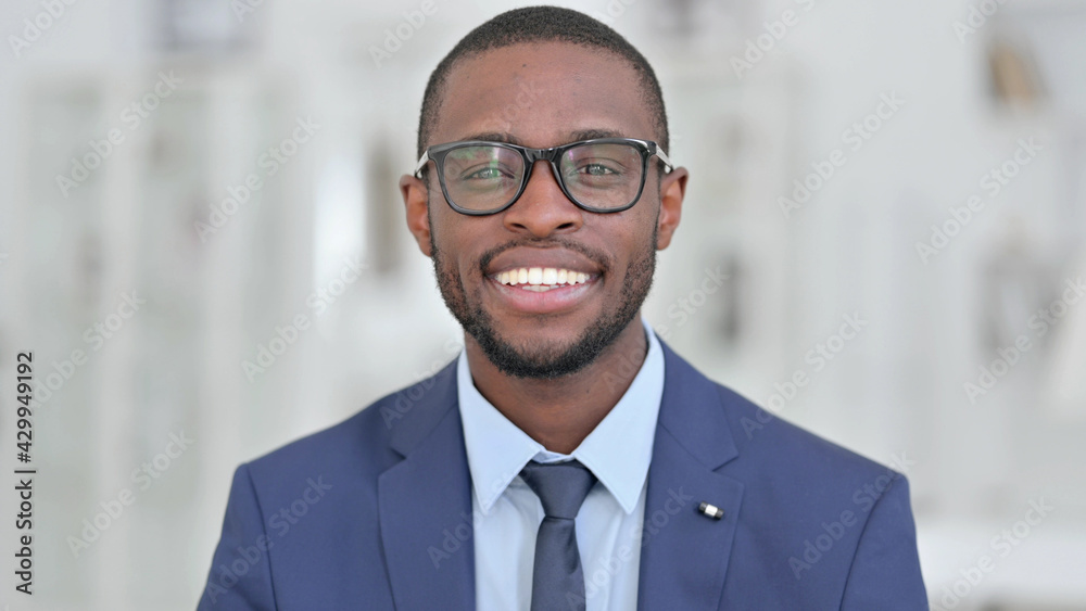 Portrait of Cheerful African Businessman doing Video Call 