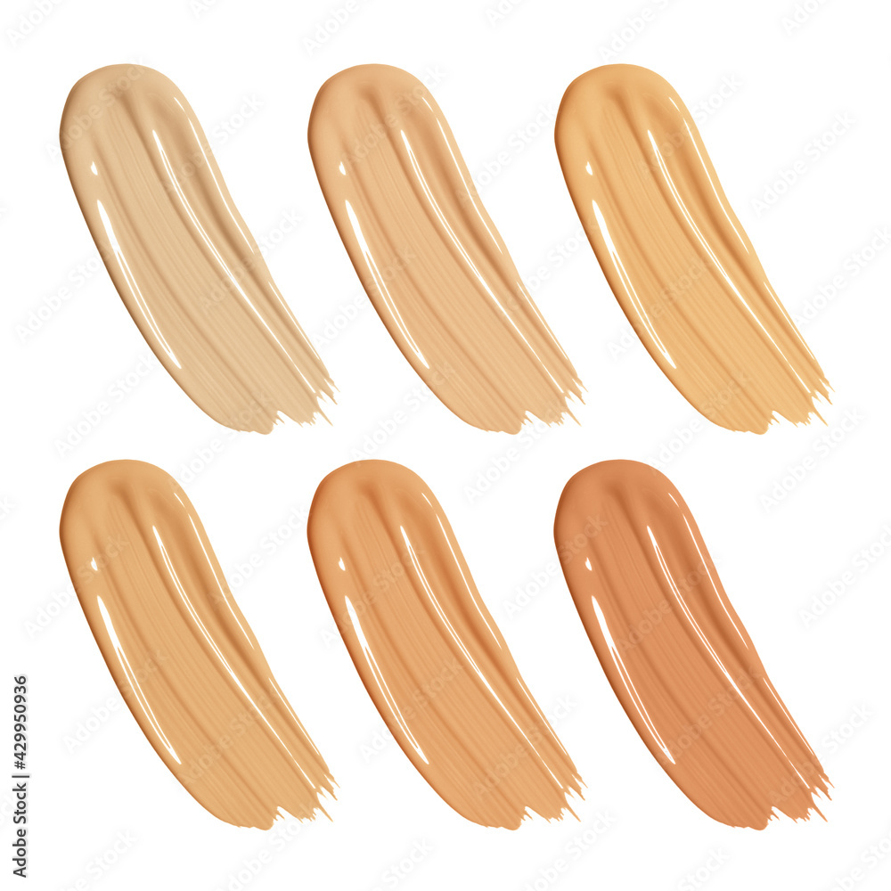 Smears of creamy foundation isolated on white background. Beige foundation makeup sample