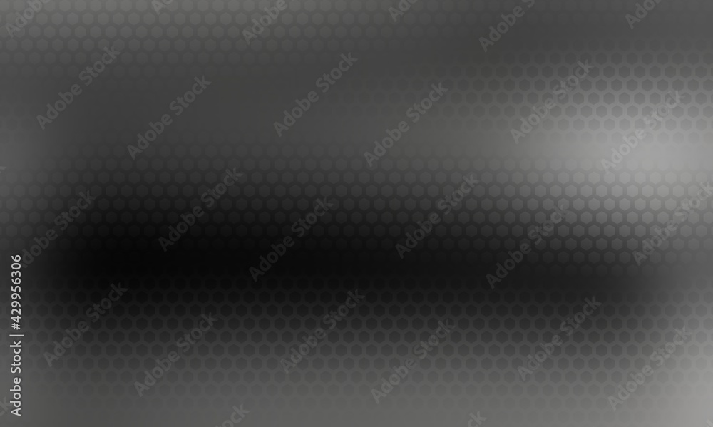 Black metal polished surface covered irregular mosaic geometric pattern.