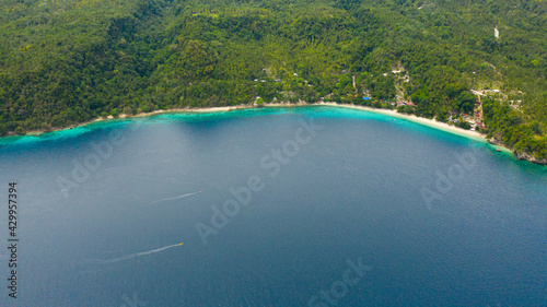 Tropical sandy beach and clear turquoise water. Canibad beach, Island Garden City of Samal, Davao.