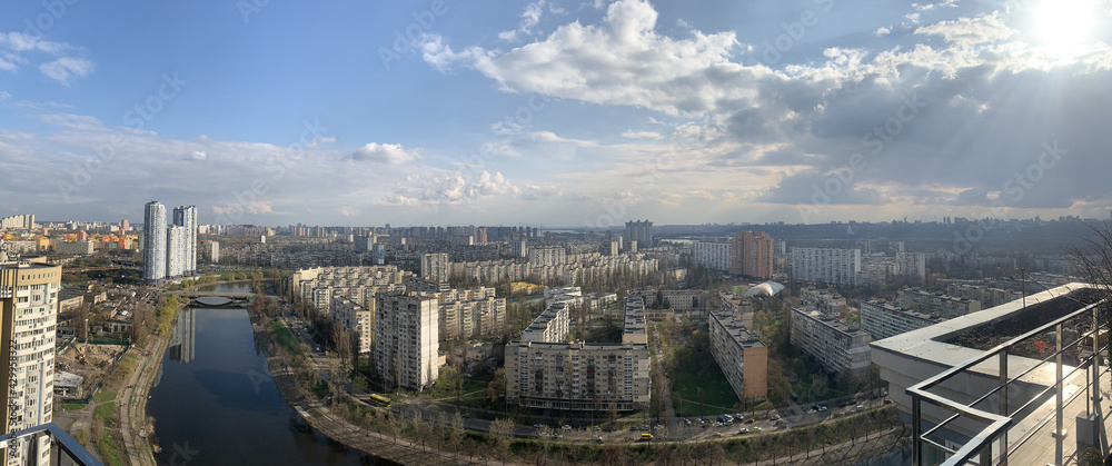 Panoramic view on residential area Rusanovka in Kiev in sunny day. Spring on Rusanivka canal, new buildings, Kyiv , Ukraine. High quality photo