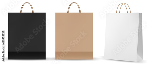 Shopping bag mockups. Paper package isolated on white background. Realistic mockup of craft paper bags.