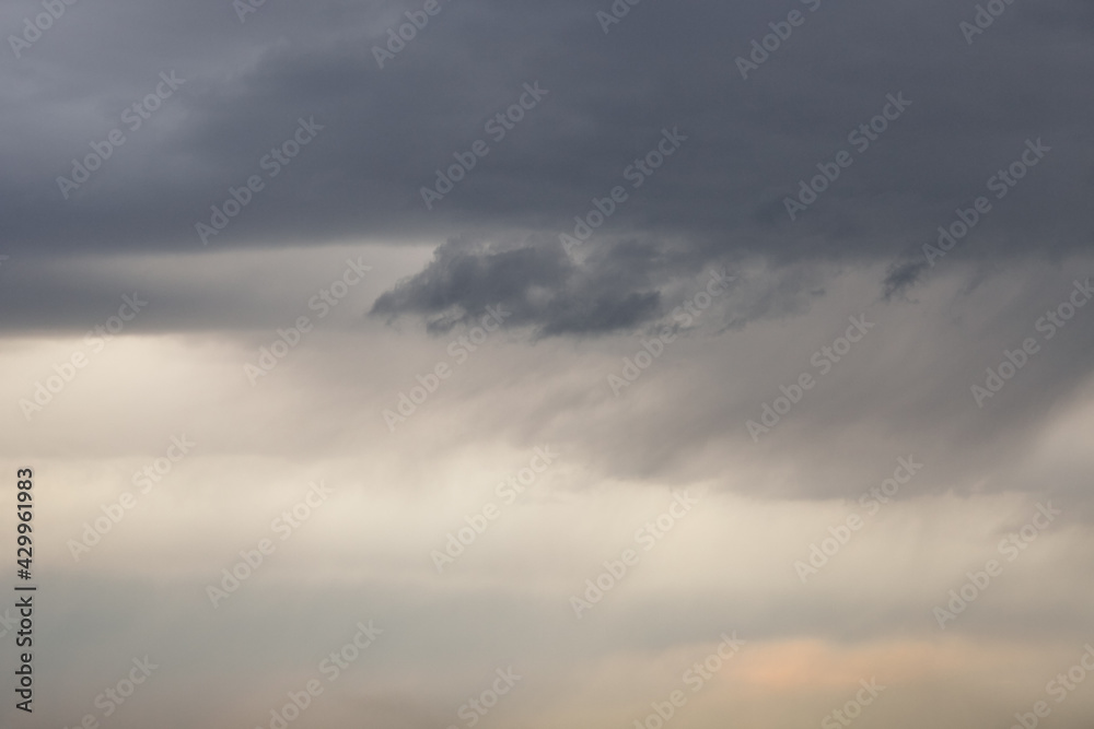 Overcast sky with rainy clouds. Grey mood abstract background. Scenic cloudscape, watercolor effect.