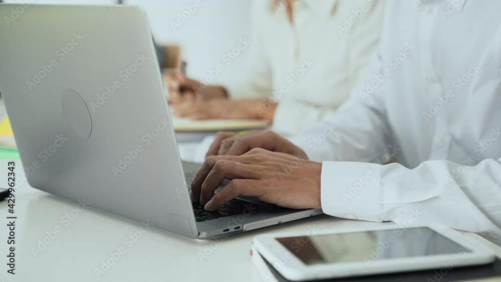 Financial inspector calculating a numbers in office room.
Financial inspector calculating a numbers in office room.