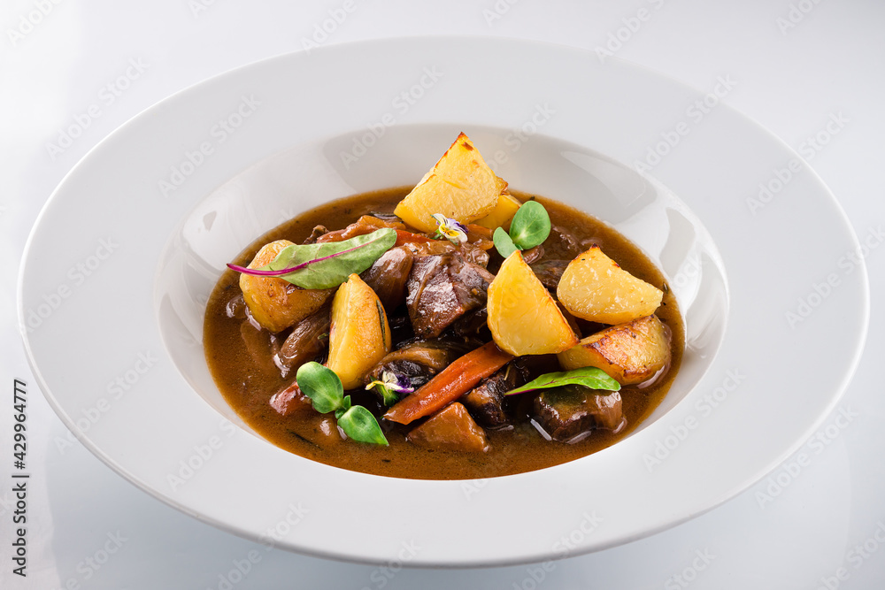 Irish Stew or Guinness Stew made in a crockpot or slow cooker. Irish Stew or Guinness Stew made in a crockpot or slow cooker.