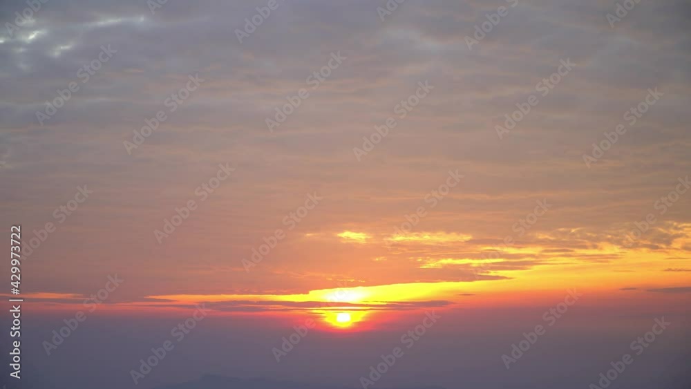 Zoom out sunrise in morning time on mountain cliff foreground and mountain view background in Thailand Zoom out sunrise in morning time on mountain cliff foreground and mountain view background in Thailand