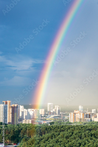 rainbow in the sky above the city