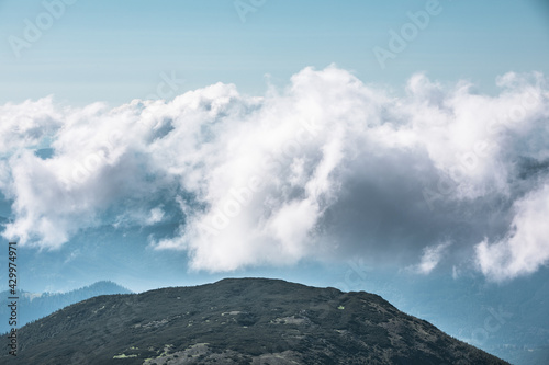 landscape view of mountains with clouds © phpetrunina14