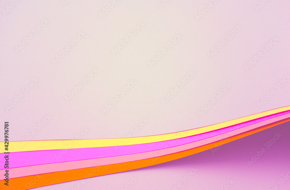 Beautiful fancy arch of curved layers papers. Colorful abstract texture background. Pastel pink, light purple and yellow burnt sienna colored blank papers. Beautiful fancy arch of curved layers papers. Colorful abstract texture background. Pastel pink, light purple and yellow burnt sienna colored blank papers.