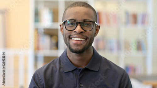 Portrait of Smiling Young African Man Looking at the Camera