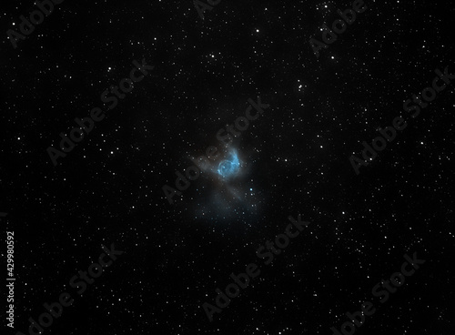 A unique blue nebula in outer space that resembles Thor's Helmet