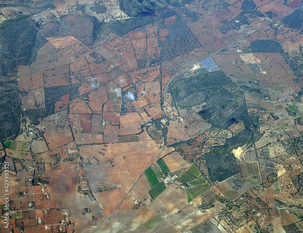 Top view of the ground. Isolated view from airplane window