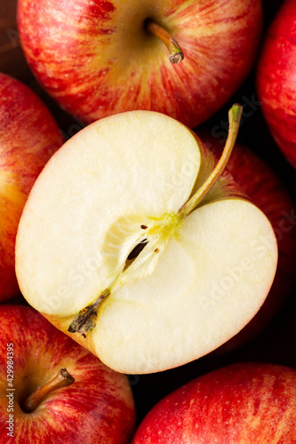 Fresh juicy red apple slices, cut, close up. macro photo