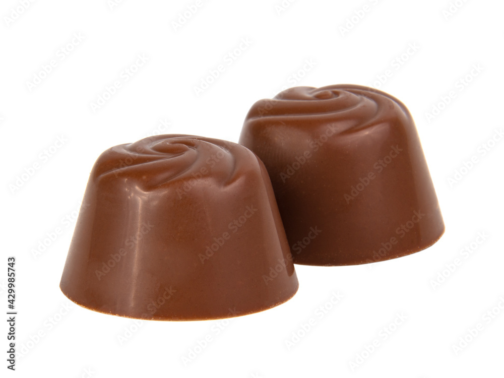 Milk chocolate candy sweet isolated on the white background Milk chocolate candy sweet isolated on the white background