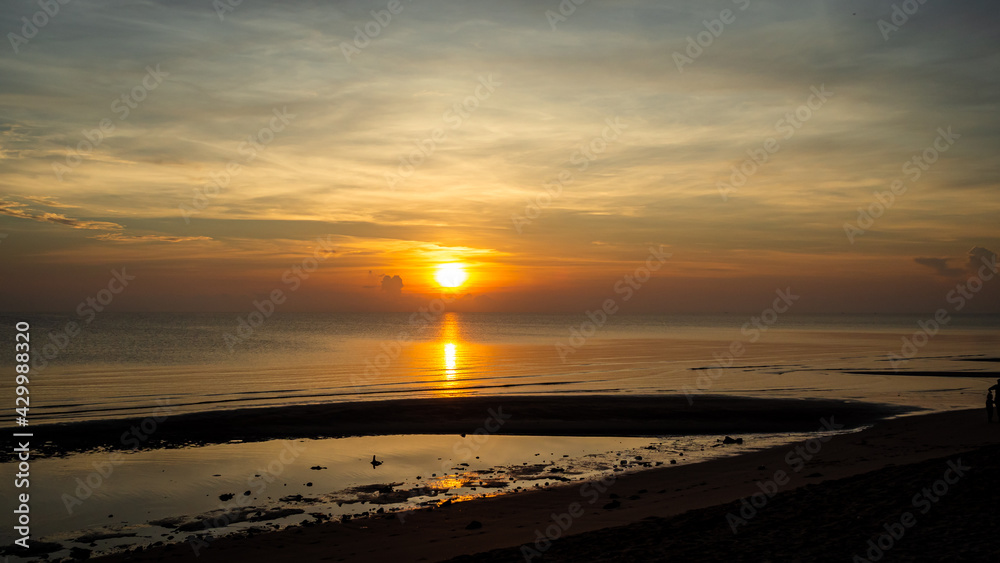 beautiful orange sunrise in the sea at Surat Thani, Thailand