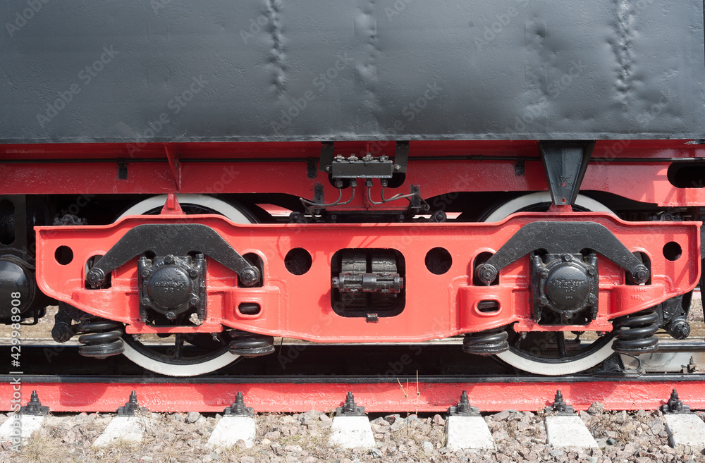 A black steam locomotive on a blue sky background Stock Photo | Adobe Stock