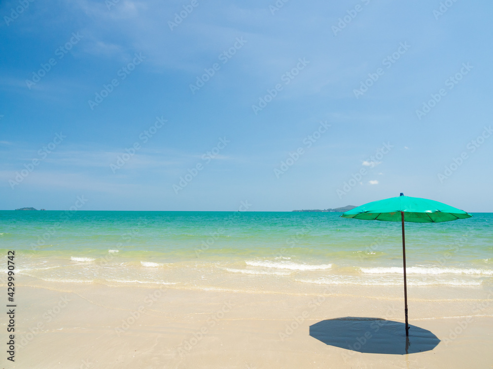 Front view beach Blue Sea wave with fresh sky on holiday with green parasol  Installed in