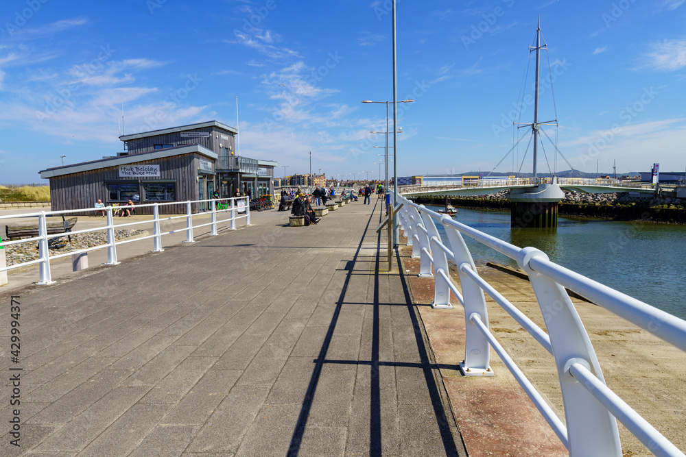 Rhyll harbour and bridge cycle hire center plus cafe hub coastal path