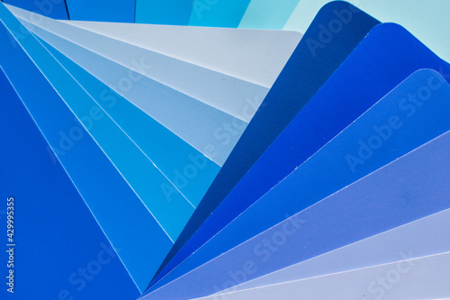 different shades of blue, abstract background from different shades of blue, abstract blue background with triangles