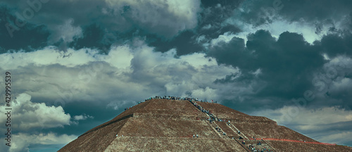 Stormy day at Teotihuacán Mexico with dark blue clouds.