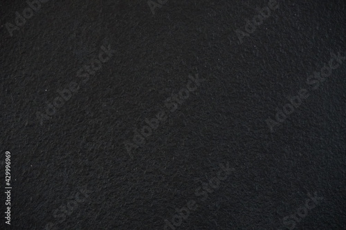 Blank dark tone textured background pattern (grey - black gradient). Abstract gray color (colour) with white dust elements, backdrop and copy space for design, text, art, projects and crafts.
