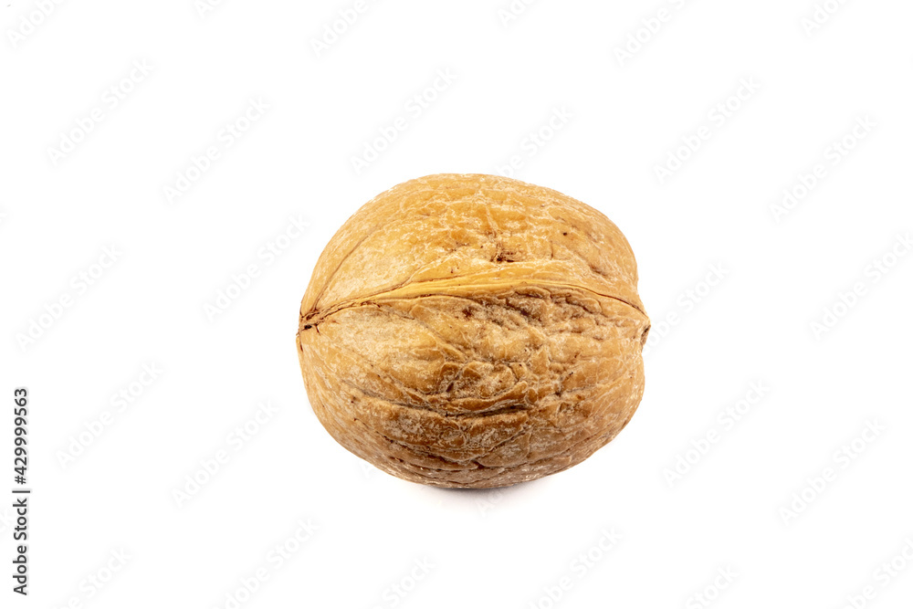 Delicious whole and broken walnuts isolated on white background. Whole and cracked walnut. Delicious whole and broken walnuts isolated on white background. Whole and cracked walnut.