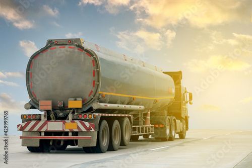 Gas Truck on highway road with tank oil container, transportation concept.,import,export logistic industrial Transporting Land transport on the expressway with blue sky.image motion blur