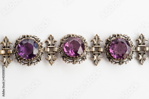 detail of an old bracelet with purple semiprecious stones