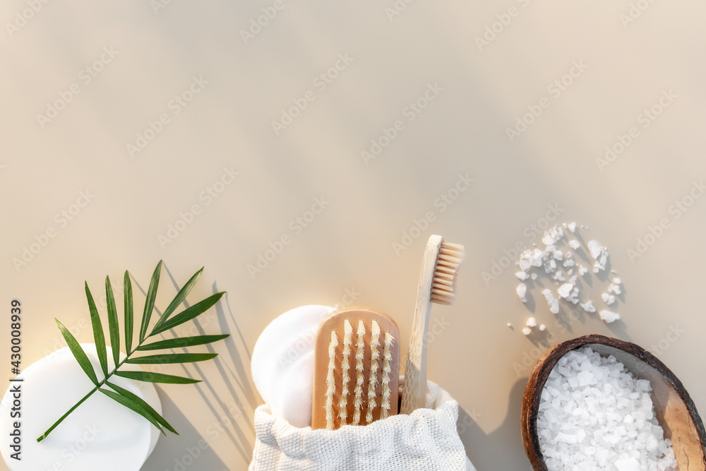 Bath accessories flat lay on beige background. Natural body care concept Bath accessories flat lay on beige background. Natural body care concept
