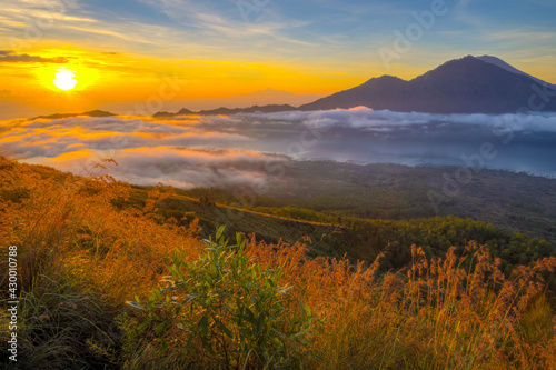 Sunrise from Mt. Batur, with view on Mt. Agung